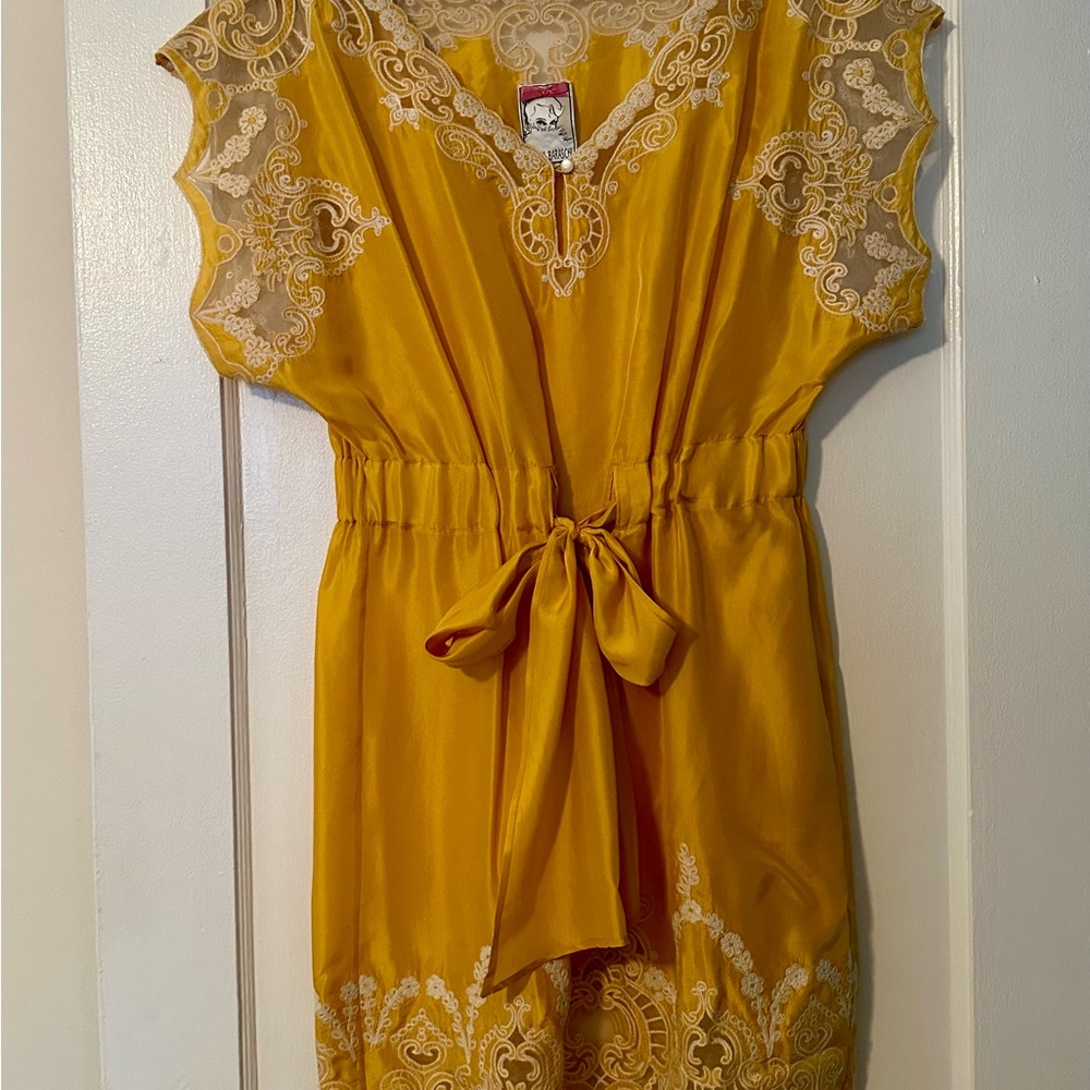 Yoana Baraschi Yellow silk dress in yellow color with intricate detail trim.
